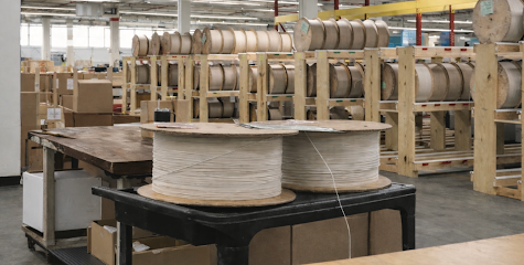 Waxed-candle-wick-on-reels-manufacturing-Wicks-Unlimited