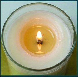 Candle showing incomplete combustion during a burn test.