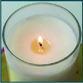Undersized candle wick with a weak flame and shallow melt pool during a burn test.
